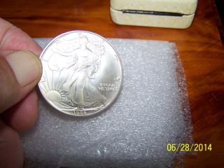 Gem Uncirculated 1986 American Silver Eagle Needs Certified. photo