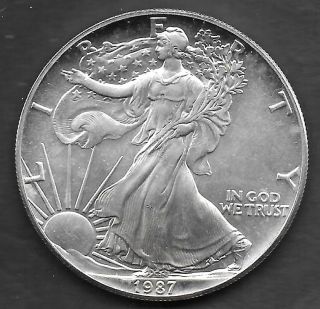 Spstamps & Coin 1987 American Silver Eagle Ungraded 1 Troy Oz.  999 Fine photo