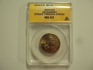 2003 - D Sacagawea Dollar,  Anacs Ms 63,  Struck Thru Grease photo
