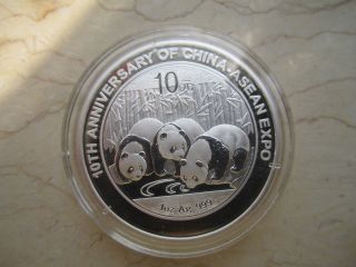 China 2013 Silver 1 Oz Panda Coin With Added Words - 10th Anniv.  China - Asean Expo photo
