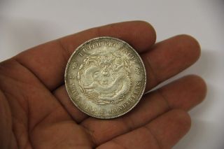 Early Chinese Silver Coin With Detailed Fierce Dragon photo