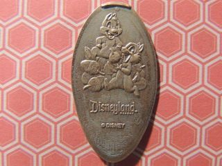 Elongated Penny Disney - Dr0126z - Chip & Dale Climbing Pile Of Acorns - Retired photo