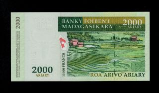 Madagascar 2000 Ariary (2003) A - A Pick 83 Unc Banknote. photo
