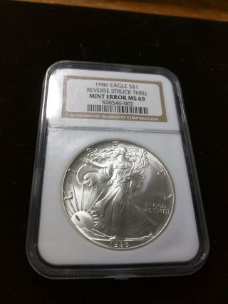 1986 $1 American Silver Eagle Ngc Ms 69 Reverse Struck Thru Error photo