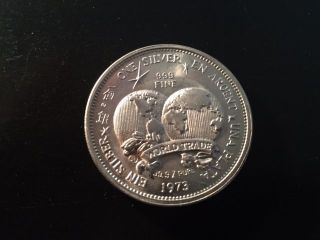 1973 World Trade Universal Trade Unit 1 Oz Troy.  999 Fine Silver Coin Round photo