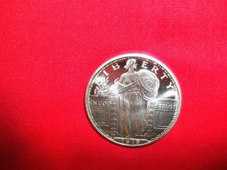 1 Troy Oz.  999 Fine Silver Round Standing Liberty Design,  Golden State. photo