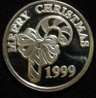 Silver Coin From 1999 Merry Christmas One Troy Oz.  999 photo