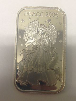 One Troy Ounce Silver Holiday Bar photo