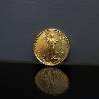 1999 1/10 Oz.  999 Gold American Eagle - $5 U.  S.  Gold Bullion Coin - photo