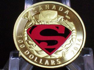 2014 Canada $100 Gold Superman N.  American photo