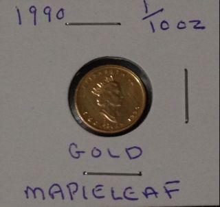 One 1990 Gold Canadian Maple Leaf $5 Coin.  