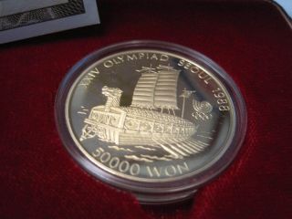 1986 One Troy Oz.  Gold 50.  000 Won Proof.  With. photo