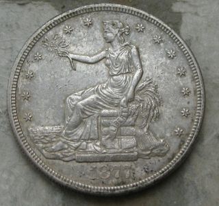 1877 - S Trade Silver Dollar.  Origianl Au/bu photo