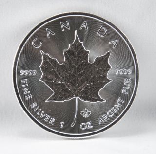 2014 Canada 1 Troy Oz.  9999 Fine Silver Maple Leaf $5 Coin photo