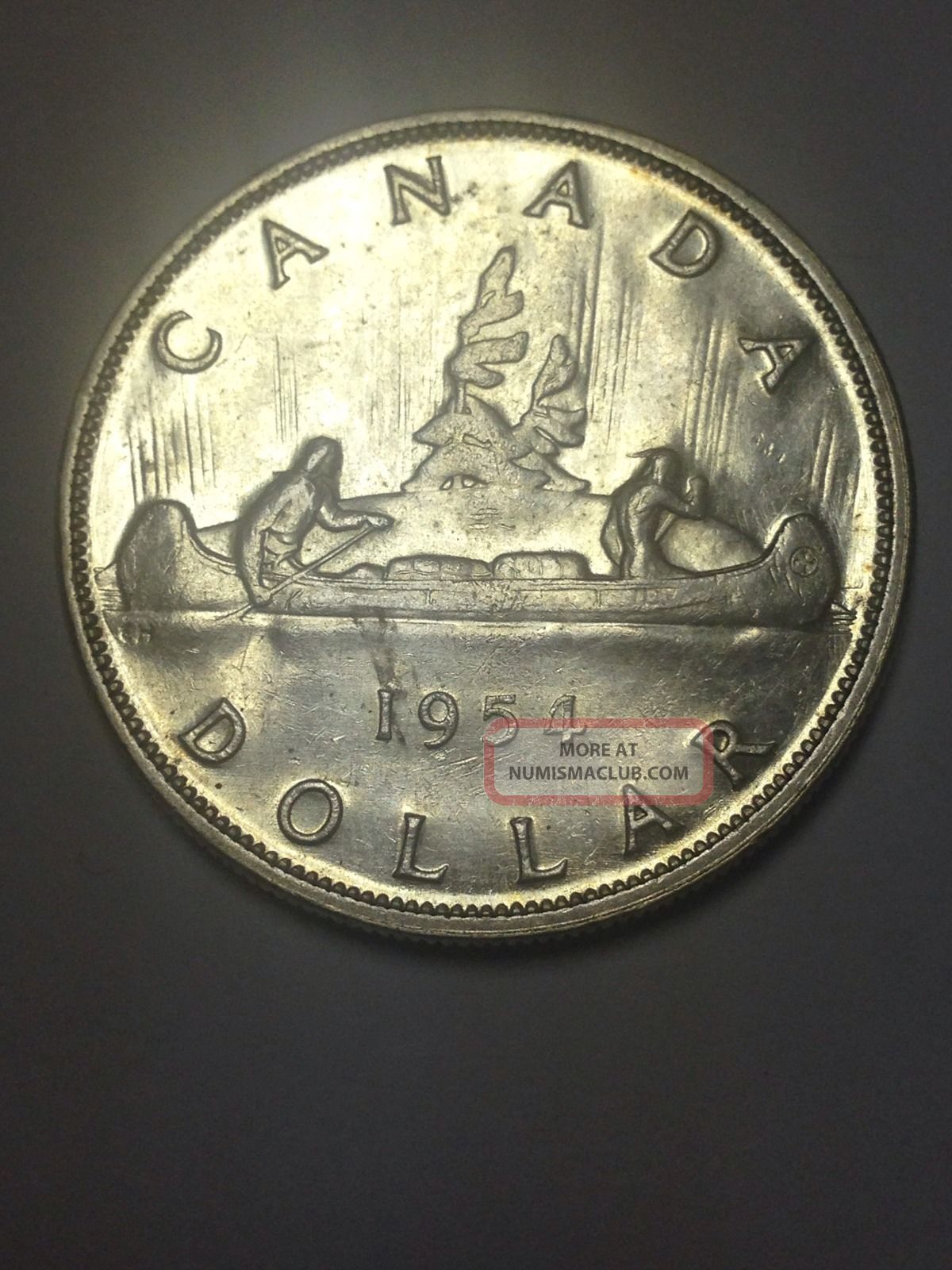 Uncirculated 1954 Canada One Dollar Silver Foreign.