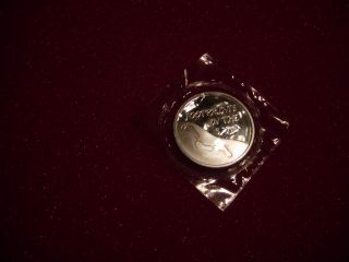 1 Oz Footprints In The Sand Silver Round photo