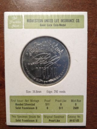 Midwestern United Life Insurance Co.  - Good Luck Coin Token Medal photo