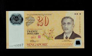 Singapore 20 Dollars (2007) Commemorative Polymer Pick 53 Unc Banknote. photo