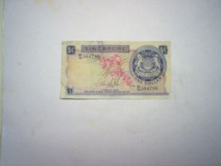 Singapore One (1) Dollar Banknote,  B/76,  No Seal.  Orchids.  Circulated.  Bw&co. photo