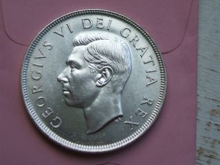 Canada Silver Dollar 1949 Lustrous Unc.  A Beauty photo