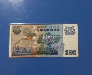 1976 - 84 (nd) Singapore Bird Series $50 Straight Security Line A/3 087161 photo