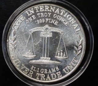 {bjstamps}1975 International Silver Trade Unit Scales 1 Ozt.  999 Fine Silver photo