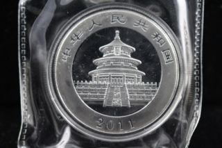 China 2011 1oz Silver Chinese Panda 10 Yuan Coin photo