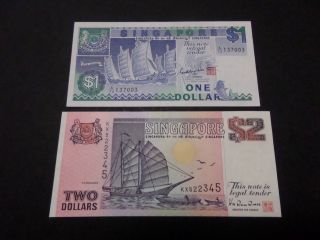 Singapore 1,  2 Dollars Nd (1987 - 1991),  Au - Unc photo