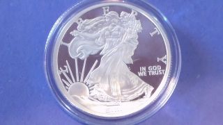 1 Oz.  999 Fine Silver On The Front Is The Walking Liberty & Spread Eagle On Rev photo