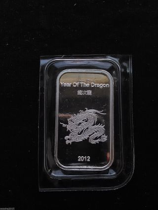 2012 1oz.  999 Fine Silver Suisse Gold Silver Dragon Bar Extremely Rare In Usa photo