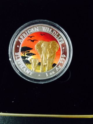 2015 1oz Somalian Colorized Sunset Elephant African Wildlife.  999pure Silver Coin photo