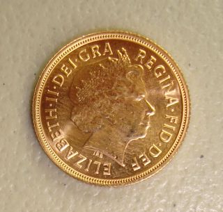 2013 British Gold Sovereign Uncirculated,  7.  98 Grams.  9167 Fine photo