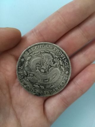 China Silver Dollar Coin Qing Dynasty Emperor Guangxu Dragon Coin Sichuan Provin photo