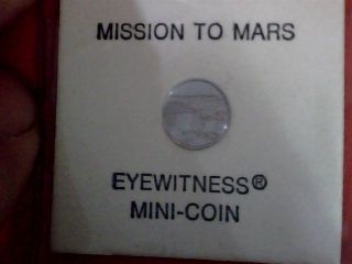 The Apollo 17 Eyewitness Franklin Mini Coin Pure.  999 Platinium 10 Mm photo