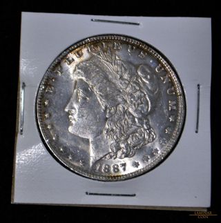 1887 $1 Morgan Silver Dollar,  Crisp And Lustrous,  Bu photo