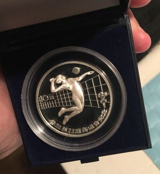 China 10 Yuan Silver Proof 1984 Olympics Volleyball.  Lovely photo