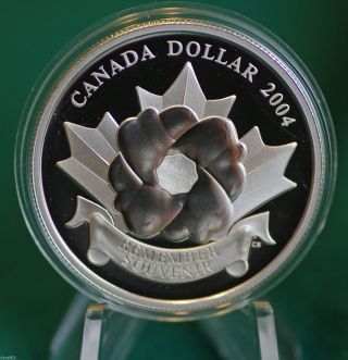2004 Canada Special Edition 99.  99 Silver Poppy Proof Dollar photo