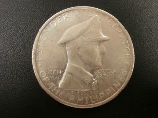 1947 - S Douglas Macarthur Philippines One Peso.  900 Silver photo