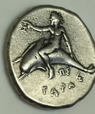 Ancient Greek Roman Coin Italy Calabria Tarentum Nomos Silver Ish Coin 300 Bc photo