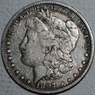 1897 O Morgan Silver Dollar $1 Coin United States. photo