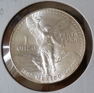 1987.  Mo.  Mexico ☆ Onza ☆ Silver Coin.  Km 494.  2 photo