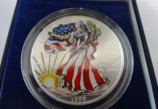 1999 Painted American Eagle.  999 Fine Silver Dollar 1 Troy Ounce & photo