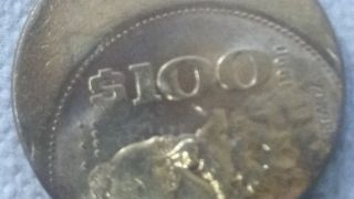 Mexican 100 Peso Off Strike Coin photo