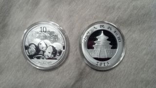 8 - 2013 Silver Chinese Panda 1 Oz Coin photo