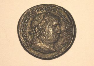 Copper Ancient Roman Follis,  Diocletian,  284 - 305 Ad,  F,  Uncleaned photo