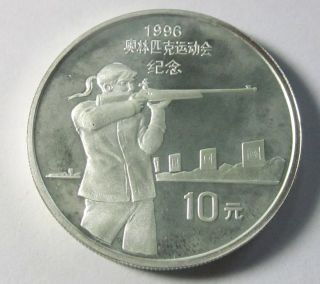 China,  People ' S Republic 10 Yuan,  1995,  Female Shooter,  Uncirculated,  Uncertified photo