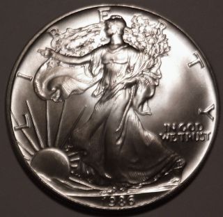 1986 American Silver Eagle 1 Oz.  999 Silver 1st Year Inaugural Issue Coin Bu photo