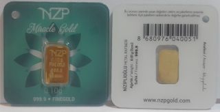 World Smallest Gold 0.  10 Gram Gold Bar 24 Karat 999,  9 Nzp Gold Int.  Sertificated photo