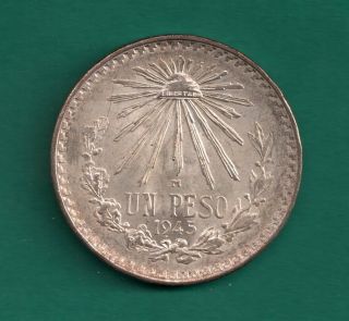 1945 Mexico Peso Unc.  7200 Silver Net.  3856 Oz.  Asw Liberty Cap Rays Reverse photo