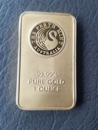 Perth 1 Oz Gold Bar Contains 1 Ounce Of 99.  99 Fine Gold. photo